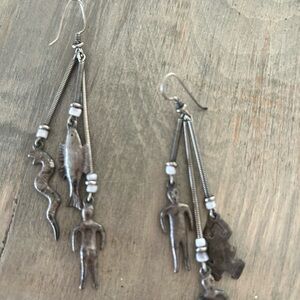 Cute earrings with Native American figures 3 inches long